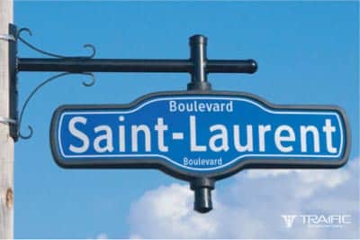 Imavision decorative street name sign on St-Laurent boulevard - Odonymic street names signs - Traffic Innovation