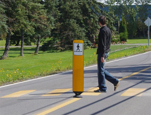Zoneguard flexible traffic sign panel on a road, at a crossing - DEFLEX Bollards and delineators - Traffic Innovation